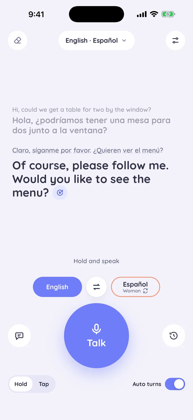 A two-turn conversation in English and Spanish, with a repeat button next to the latest translation